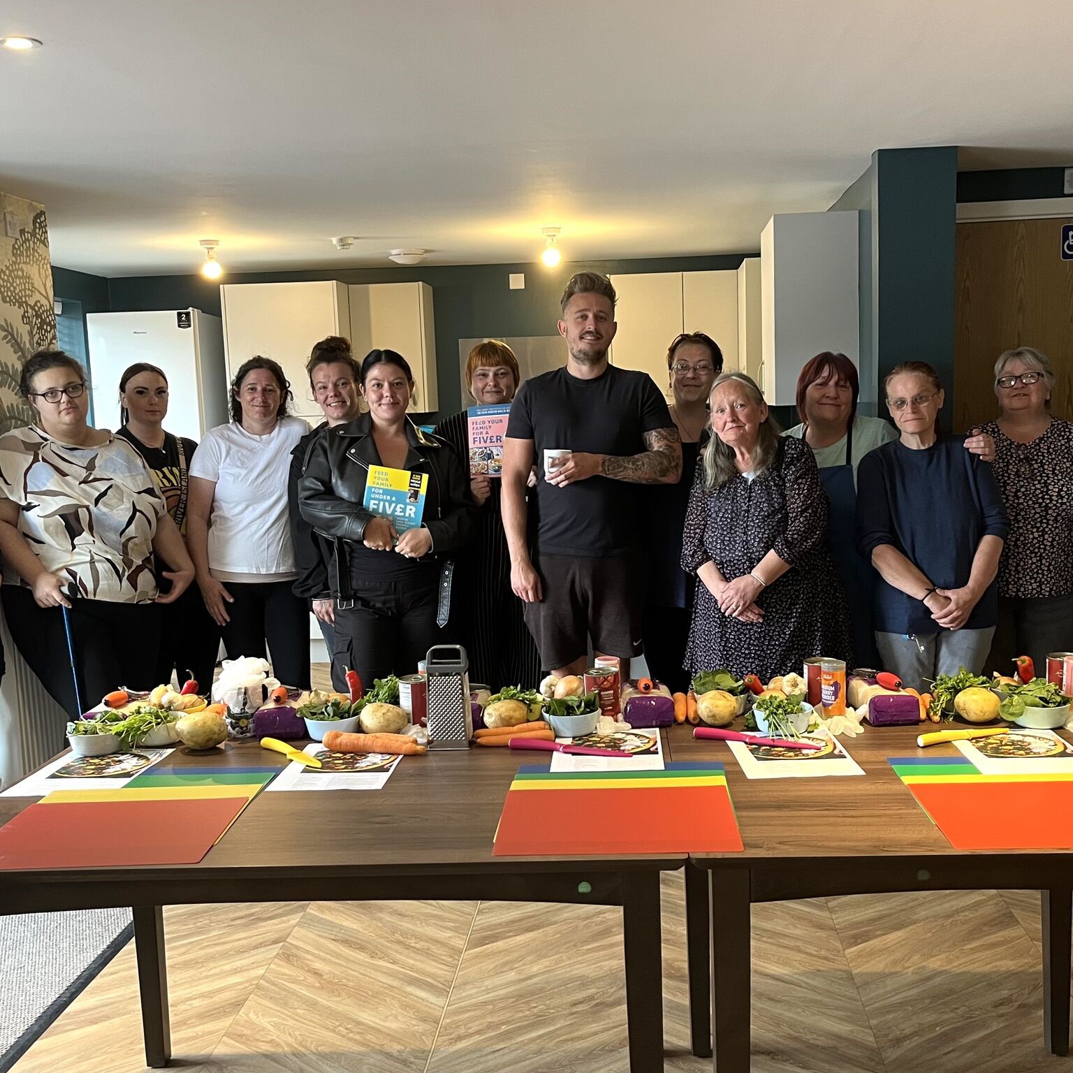 Group photo of tenants and Mitch Lane as part of our Food Matters Programme